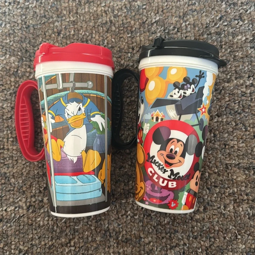 Set of 2 Disney parks whirley rapid refill‎ mugs with lids